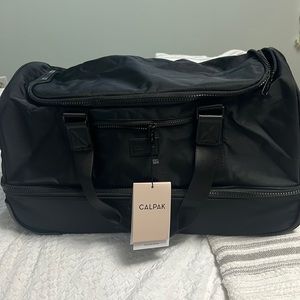 NWT Calpak rolling duffel-Black